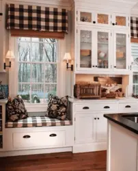 Kitchen design with drawers by the window