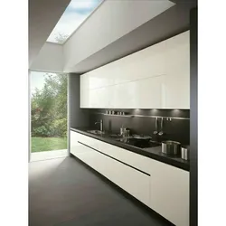 Design of a straight kitchen in a modern style with a refrigerator