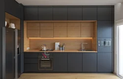 Design of a straight kitchen in a modern style with a refrigerator