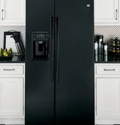 Black refrigerator in the kitchen interior photo how