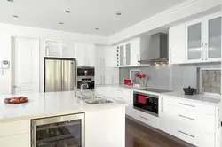 Kitchen design with white appliances interior photo