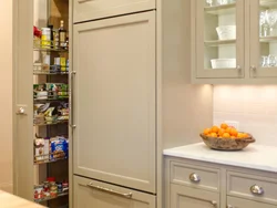 Narrow cabinets in the kitchen interior