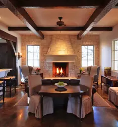 Interiors kitchen living room with fireplace photo in style
