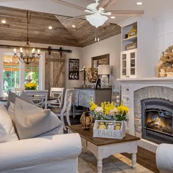 Interiors kitchen living room with fireplace photo in style