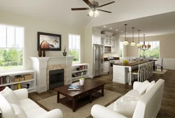 Interiors kitchen living room with fireplace photo in style