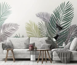 Wallpaper with palm leaves in the bedroom interior