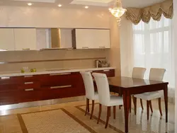 White kitchen interior with brown table