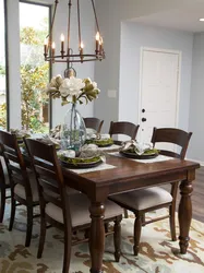 White Kitchen Interior With Brown Table