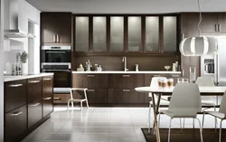 White kitchen interior with brown table