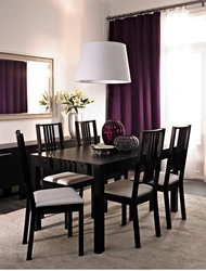 White kitchen interior with brown table