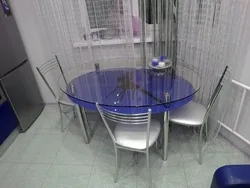 Кухня з круглым шкляным сталом фота