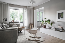 One gray wall in the living room interior