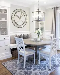 Photo of a round table for the kitchen against the wall
