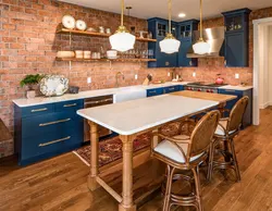 Blue kitchen in the interior photo with wooden