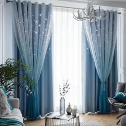 Gray living room with blue curtains photo