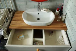 Bathroom design with countertop sink