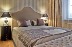 Bed With A Blanket In The Bedroom Interior