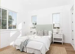 Bedroom wall design with white furniture