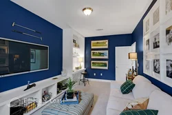 Living room with blue furniture photo