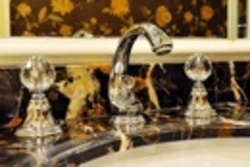 Gold faucets in the bathroom interior