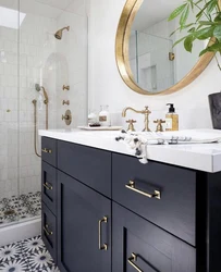 Gold faucets in the bathroom interior