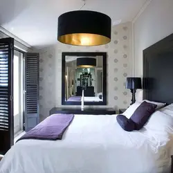 Black lamps in the bedroom interior