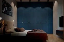 Interior with blue wardrobe in the bedroom