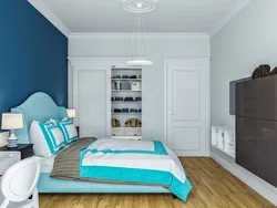 Interior with blue wardrobe in the bedroom