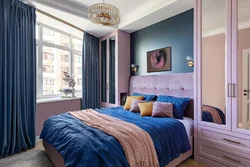 Interior with blue wardrobe in the bedroom