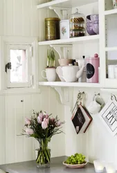 Open shelves for the kitchen on the wall in the interior