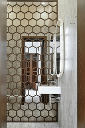 Honeycomb mirrors in the hallway photo