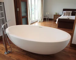 Oval bathtubs in the bathroom interior