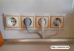 Sockets on the wall in the kitchen photo