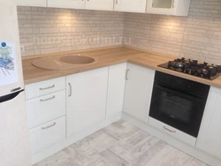Light oak countertop in the kitchen interior