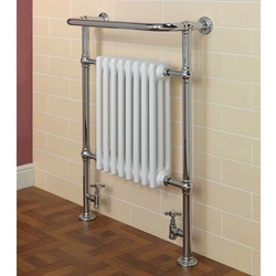 Heating radiator in the bathroom photo