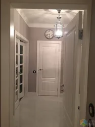 Hallway design with white doors