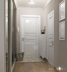 Дизайн прихожей с белыми дверями