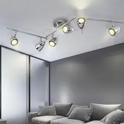 Track lighting system in the bedroom interior