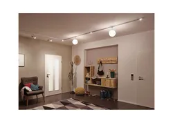 Track lighting system in the bedroom interior