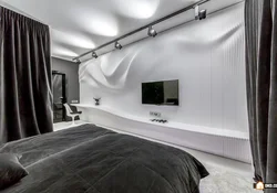 Track lighting system in the bedroom interior