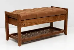 Banquette in the hallway made of wood, drawings and photos