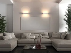 Sconce above the sofa in the living room in the interior
