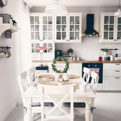 Scandinavian style kitchen in white interior