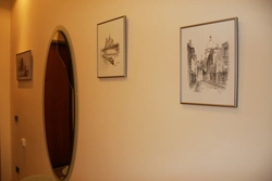 Is it possible to hang photographs in the hallway?