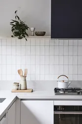Kitchen apron made of white hog tiles photo