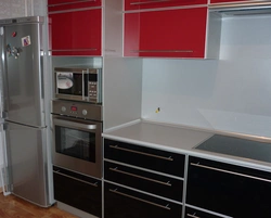 Photo Of A Kitchen With Built-In Oven And Microwave