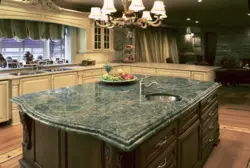 Dark green countertop in the kitchen photo