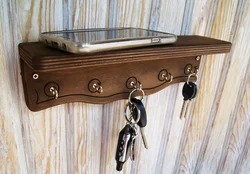 DIY wall-mounted housekeeper for the hallway made of wood photo
