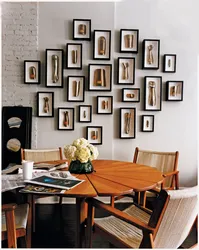 Wall with photographs in the kitchen