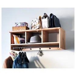 Shelf for hats in the hallway photo